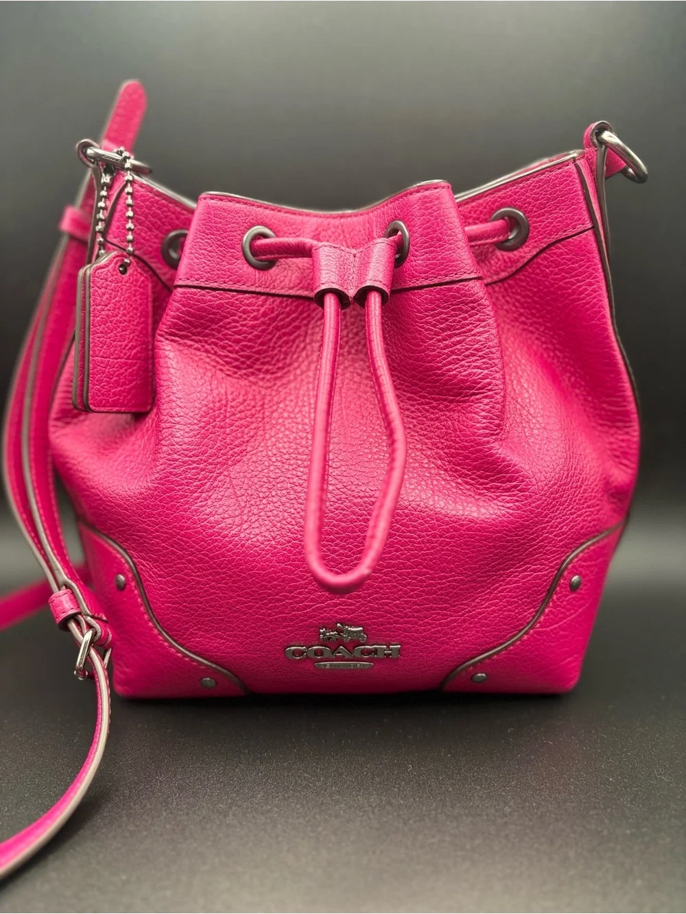 Coach Mickie Fuchsia Pebbled Leather Drawstring Crossbody Bag